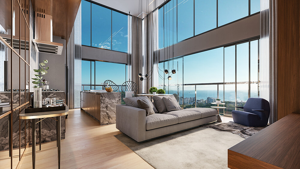 Living duplex do Pantai Brava. As paredes de vidro permitem a vista da Praia Brava, há a combinação do sofá e poltrona no exemplo em questão.