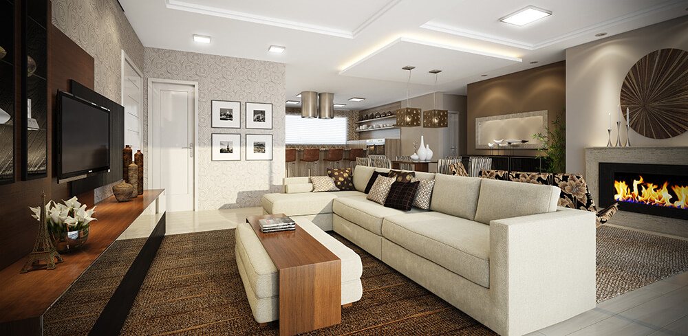 Sala de estar Sonata, há um sofá em formato de L posicionado de frente a televisão, mesa de centro em tecido com madeira e a lareira acesa.